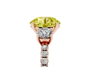 Fancy Yellow Round Cut Diamond Three-Stone Ring Set in Rose gold with Pavé Band and Graduated Sides