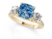 Fancy Blue Three-Stone Cushion Cut Diamond Pavé Band Ring Set in Yellow gold with Prong-Set Trio