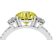 Fancy Yellow Round Cut Diamond Three-Stone Ring Set in Platinum with Pavé Band and Graduated Sides