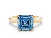 Fancy Blue Asscher Cut Diamond Solitaire Ring Set in Yellow gold with Prong Head and Smooth Polished Band
