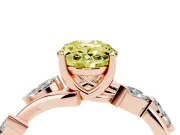 Fancy Yellow Oval Cut Diamond Solitaire Ring Set in Rose gold with Twisted Marquise Accent Band
