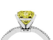 Fancy Yellow Princess Cut Diamond Solitaire Ring Set in White gold with Twisted Band and Bead Prong Setting