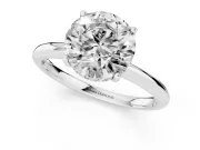 Round Cut Diamond Solitaire Engagement Ring Set in Silver with Prong Setting and Polished Band