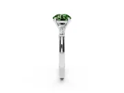 Fancy Green Round Cut Diamond Solitaire Ring Set in White gold with Tapered Baguette Side Stones and Prong Setting
