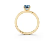 Fancy Blue Emerald Cut Diamond Solitaire Ring Set in Yellow gold with Thin Band and Prong Setting