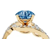 Fancy Blue Round Cut Diamond Solitaire Ring Set in Yellow gold with Pavé Twist Band and Secure Prong Setting