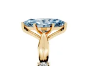 Fancy Blue Marquise Cut Diamond Solitaire Twisted Band Ring Set in Yellow gold with Accent Stones and Prong Setting