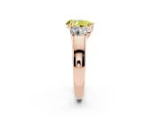 Fancy Yellow Three-Stone Pear Cut Diamond Ring Set in Rose gold with Matching Prong Settings and Plain Band