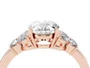 Oval Cut Diamond Solitaire Floral Ring Set in Rose gold with Marquise Petals and Prong Setting
