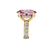 Fancy Pink Oval Cut Diamond Pavé Band Ring Set in Yellow gold with Prong-Set Center Stone