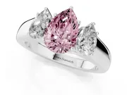 Fancy Pink Three-Stone Pear Cut Diamond Ring Set in Platinum with Matching Prong Settings and Plain Band
