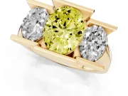 Fancy Yellow Oval Cut Diamond Three-Stone Channel Set Ring Set in Yellow gold with Smooth Polished Band