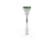 Fancy Green Three-Stone Emerald Cut Diamond Ring Set in Platinum with Pear Side Stones and Prong Setting