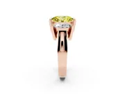 Fancy Yellow Oval Cut Diamond Three-Stone Channel Set Ring Set in Rose gold with Smooth Polished Band