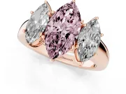 Fancy Pink Three-Stone Marquise Cut Diamond Ring Set in Rose gold with Matching Prong Settings and Plain Band
