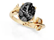 Fancy Black Oval Cut Diamond Solitaire Twist Engagement Ring Set in Yellow gold with Pavé Leaf Accents