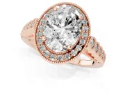 Oval Cut Diamond Milgrain Halo Solitaire Ring Set in Rose gold with Bezel Set Side Stones and Pavé Band
