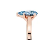 Fancy Blue Pear Cut Diamond Solitaire Ring Set in Rose gold with Prong Setting and Classic Band