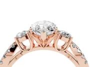 Marquise Cut Diamond Three-Stone Ring Set in Rose gold with Pavé Split Shank and Prong Setting