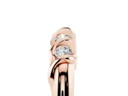 Round Diamond Eternity Band Set in Rose gold with Twist Prong Setting