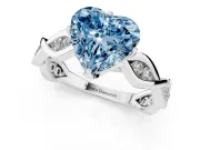 Fancy Blue Heart Cut Diamond Twist Band Solitaire Ring Set in White gold with Leaf Prong Setting and Accent Stones