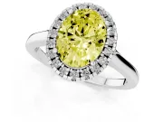 Fancy Yellow Oval Cut Halo Round Diamond Solitaire Ring Set in Silver with Pavé Band and Prong Setting