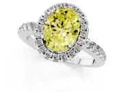 Fancy Yellow Oval Cut Diamond Pavé Band Halo Engagement Ring Set in Platinum with Prong Setting