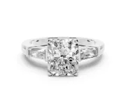Radiant Cut Diamond Solitaire Ring Set in White gold with Tapered Baguette Side Stones and Prong Setting