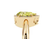 Fancy Yellow Pear Cut Diamond Halo Engagement Ring Set in Yellow gold with Plain Split Shank and Prong Setting