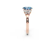 Fancy Blue Oval Cut Diamond Solitaire Floral Ring Set in Rose gold with Marquise Petals and Prong Setting