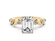 Emerald Cut Diamond Solitaire Ring Set in Yellow gold with Ribbon Twist Band, Round Accents and Prong Setting