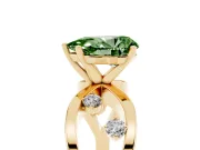 Fancy Green Pear Cut Diamond Solitaire Ring Set in Yellow gold with Side Stones on Criss-Cross Band and Prong Setting