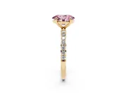 Fancy Pink Oval Cut Diamond Solitaire Ring Set in Yellow gold with Round Pavé Band and Prong Setting