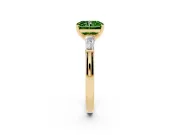 Fancy Green Radiant Cut Diamond Solitaire Ring Set in Yellow gold with Tapered Baguette Side Stones and Prong Setting