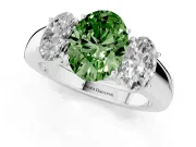 Fancy Green Three-Stone Oval Cut Diamond Ring Set in Platinum with Matching Prong Settings and Plain Band