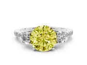 Fancy Yellow Round Cut Diamond Three-Stone Ring Set in Platinum with Pavé Band and Graduated Sides