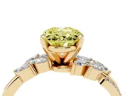 Fancy Yellow Oval Cut Diamond Solitaire Ring Set in Yellow gold with Marquise Twist Band and Prong Setting