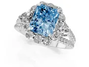 Fancy Blue Radiant Cut Diamond Halo Split Shank Engagement Ring Set in Platinum with Prong-Held Center Stone