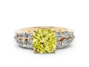 Fancy Yellow Cushion Cut Diamond Cluster Engagement Ring Set in Yellow gold with Pavé Band and Prong Setting