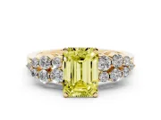 Fancy Yellow Emerald Cut Diamond Cluster Engagement Ring Set in Yellow gold with Pavé Band and Prong Setting