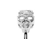 Cushion Cut Diamond Solitaire Ring Set in Platinum with Cluster Accents on Each Side