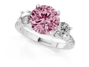 Fancy Pink Three-Stone Round Cut Diamond Pavé Band Ring Set in White gold with Prong-Set Trio