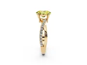 Fancy Yellow Oval Cut Diamond Twist Band Solitaire Set in Yellow gold with Pavé Accents and Prong Setting