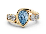 Pear-Shaped Bezel Bypass Engagement Ring Setting for a Fancy Blue Lab-Grown Diamond | Yellow Gold