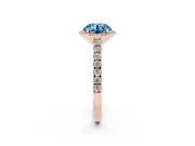 Fancy Blue Round Cut Diamond Halo Engagement Ring Set in Rose gold with Pavé Band and Prong Setting