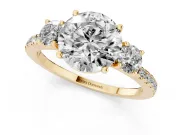 Round Cut Diamond Three-Stone Ring Set in Yellow gold with Pavé Band and Graduated Sides
