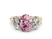 Fancy Pink Oval Cut Diamond Three-Stone Ring Set in Yellow gold with Braided Band