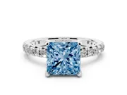 Fancy Blue Princess Cut Diamond Pavé Solitaire Ring Set in Platinum with Round Band and Prong Setting