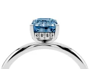 Fancy Blue Emerald Cut Diamond Solitaire Engagement Ring Set in Platinum with Prong Setting and Polished Band