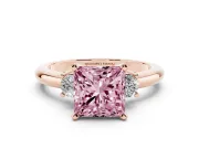 Fancy Pink Three-Stone Princess Cut Diamond Ring Set in Rose gold with Prong Setting and Plain Band
